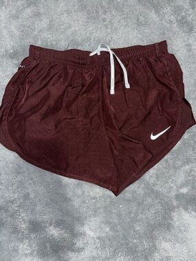 Nike Women's Maroon Athletic Shorts with White Swoosh
